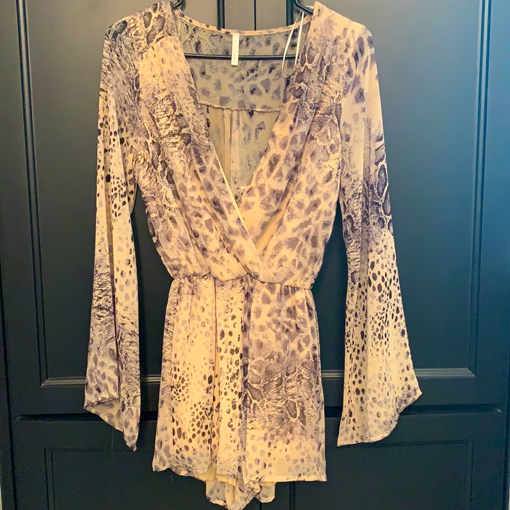 Animal print black and taupe romper